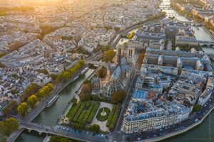 Over Paris Ile de la Cite Golden Light DJI Mavic Pro 2.jpg An aerial view of Paris and Notre Dame before the fire.